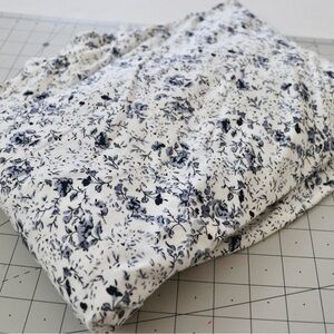Blue and white floral print knit fabric, 2.5 yards over